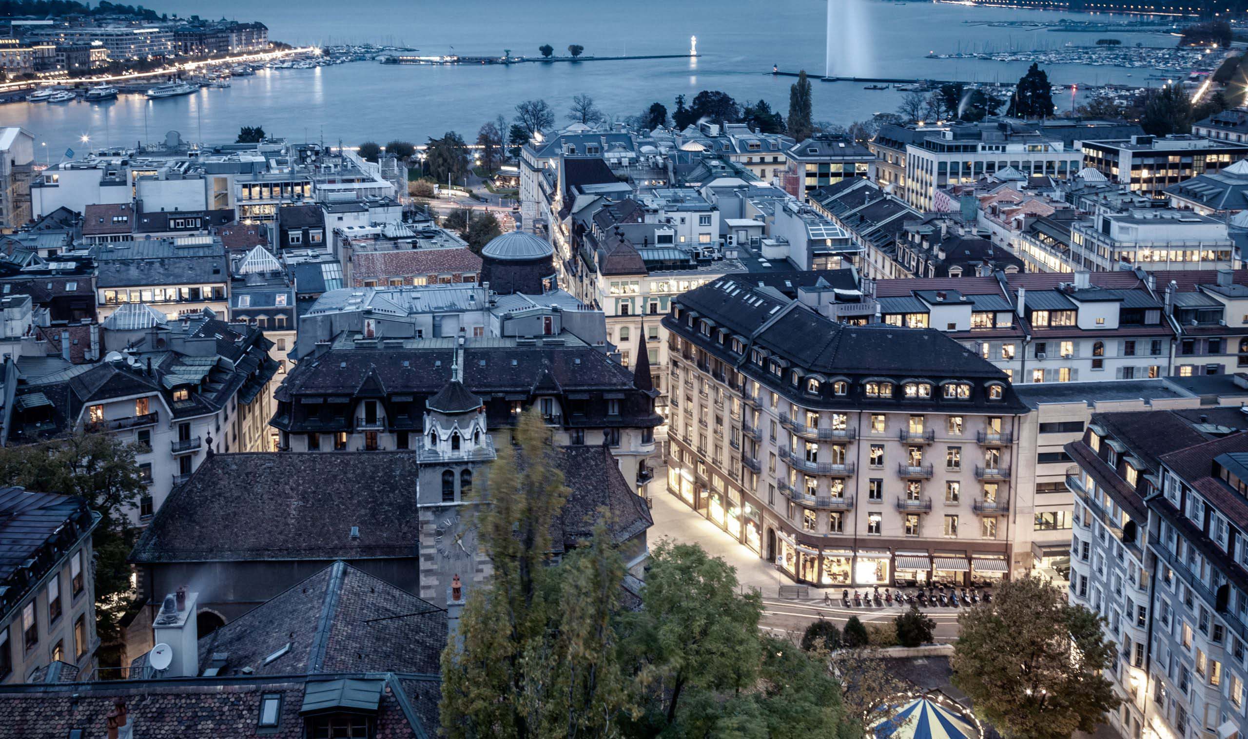 An aerial view of the marketing agency in Geneva at dusk.