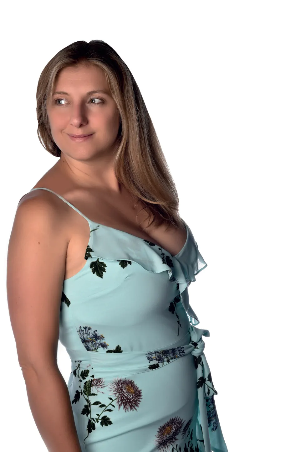A woman in a blue dress posing for a marketing agency photo.