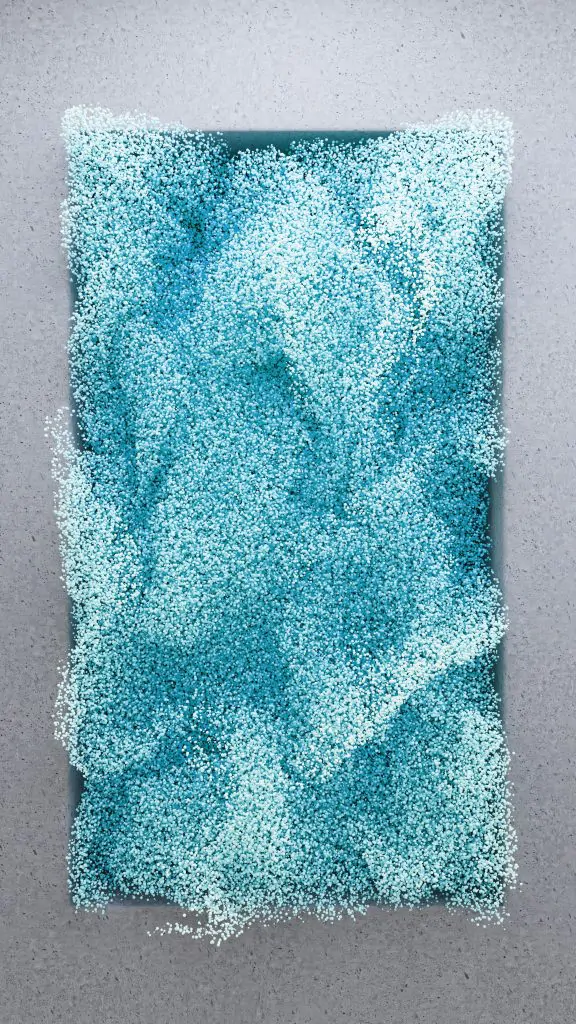 Un morceau de tissu bleu sur une surface blanche conçu grâce au pouvoir des créations numériques.